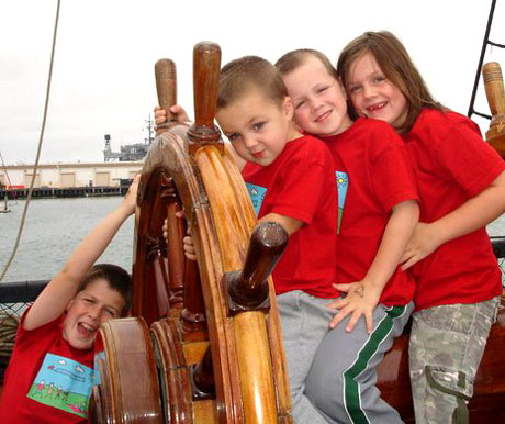 Kids at the ships helm